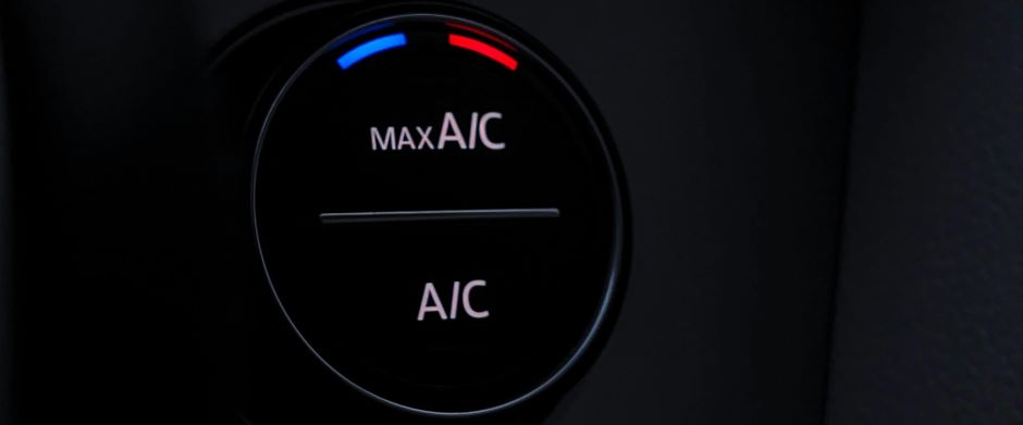 close up of car ac and heating dial